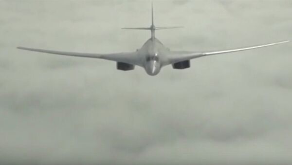 Кадр видео:  Массированный удар самолетами Дальней авиации по объектам инфраструктуры ИГИЛ в Сирии