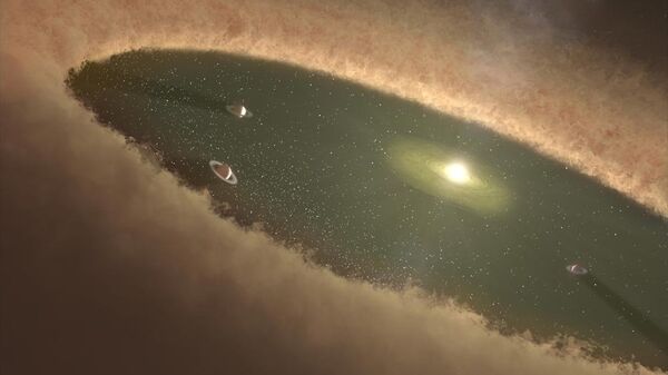 Так художник представил себе протопланетный диск с формирующимися планетами