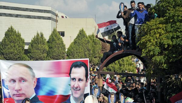 Участники митинга студентов университета Баас в поддержку операции Воздушно-космических сил РФ в Сирии, архивное фото
