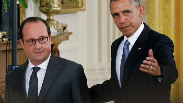 Президент США Барак Обама и президент Франции Франсуа Олланд на совместной пресс-конференции в Вашингтоне