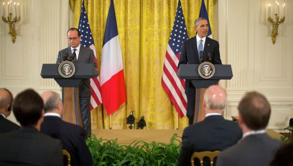 Президент США Барак Обама и президент Франции Франсуа Олланд на совместной пресс-конференции в Вашингтоне