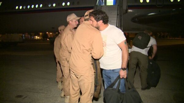 Раненые журналисты обнялись с военными на базе Хмеймим перед вылетом в РФ