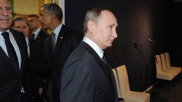 Президент России Владимир Путин и президент США Барак Обама на климатической конференции ООН в Париже