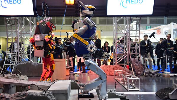 Роботы на выставке International Robot Exhibition в Токио
