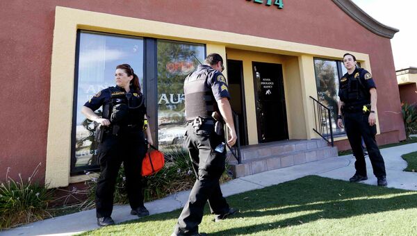 Полиция на месте стрельбы в Сан-Бернадино. Калифорния
