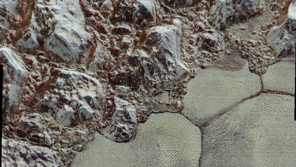 Новые детальные снимки Плутона опубликовало НАСА