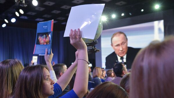 Президент России Владимир Путин и журналисты на одиннадцатой большой ежегодной пресс-конференции