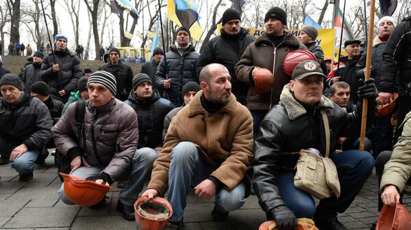Украинские шахтеры на митинге у здания Верховной Рады Украины. 23 декабря 2015