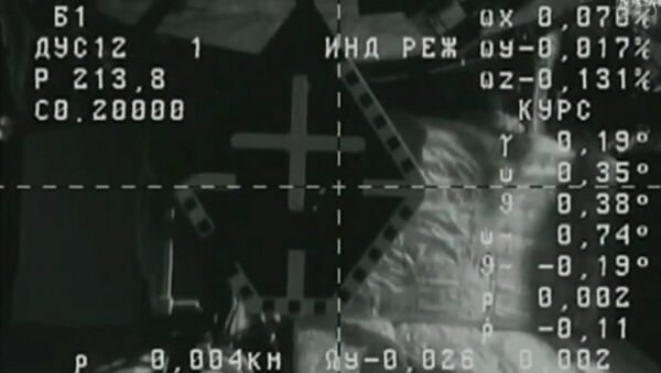 Момент стыковки с МКС первого корабля новой серии Прогресс МС-01