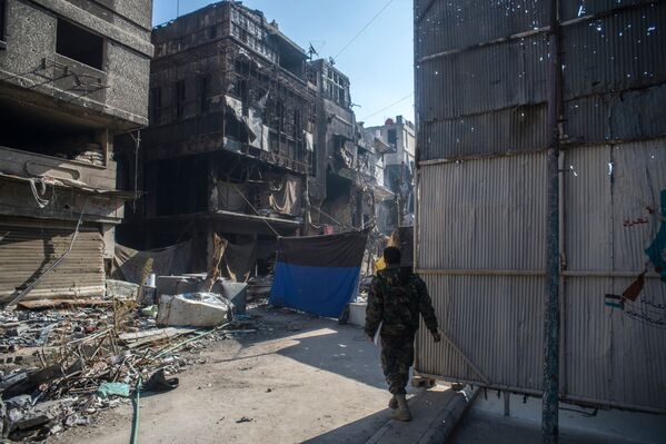 Разрушения в районе Ярмук в Дамаске