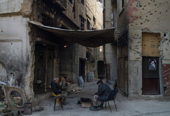 Беженцы в районе Ярмук в Дамаске
