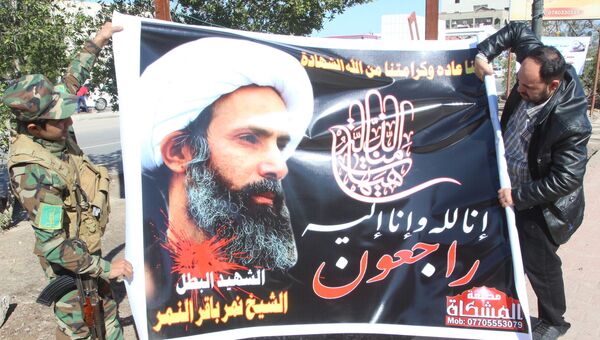 Баннер с изображением казненного шиитского проповедника Нимра ан-Нимра, 3 января 2016