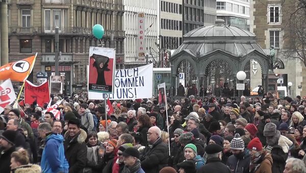 Марш в Кельне и митинг в Штутгарте: Германия протестует против насилия
