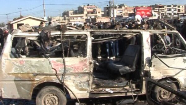 Последствия двойного теракта в сирийском городе Хомсе