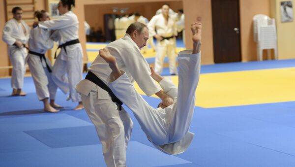Президент России Владимир Путин на тренировке. Архивное фото