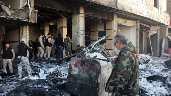 Последствия двойного теракта в шиитском квартале Саида Зайнаб в Дамаске. Архивное фото
