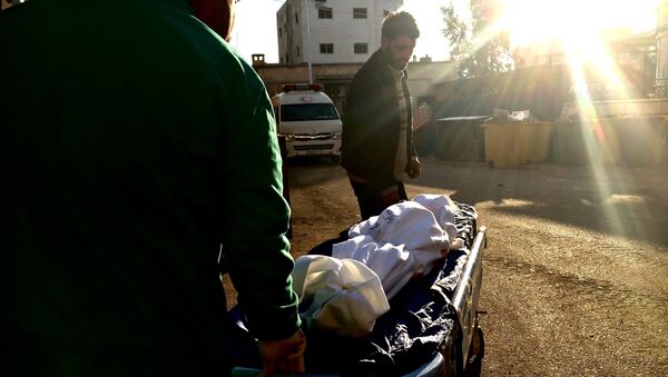 Пострадавшие в результате минометного обстрела террористов в больнице города Дераа