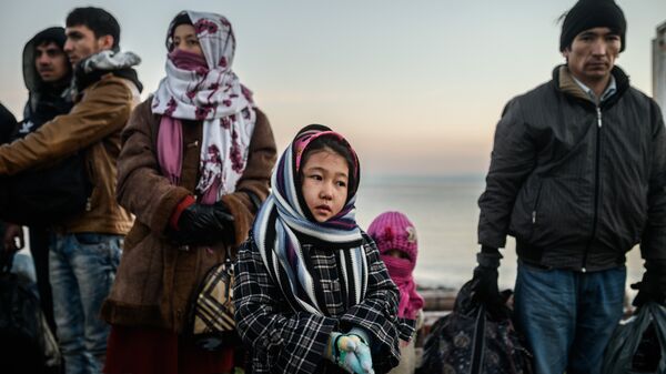 Сирийские беженцы на турецкой границе. Архивное фото