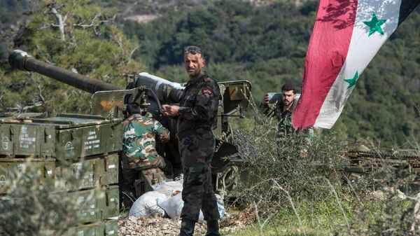 Артиллеристы сирийской армии на позициях в провинции Идлиб. Архивное фото