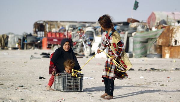 Дети играют на улице. Ирак. Архивное фото