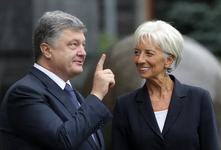 Президент Украины Петр Порошенко и директор-распорядитель МВФ Кристин Лагард. Февраль 2016 года Президент Украины Петр Порошенко и директор-распорядитель МВФ Кристин Лагард. Февраль 2016 года