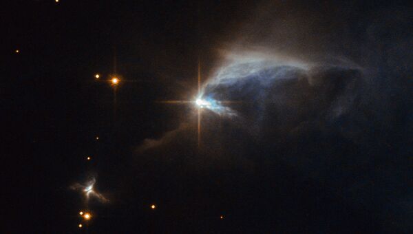 Фотография туманности IRAS 00044+6521, где находится звезда-тинейджер