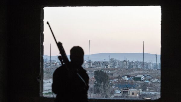 Вид на район Дамаска, контролируемый боевиками. Архивное фото