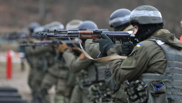 Военнослужащие Национальной гвардии Украины во время обучения по методике НАТО на полигоне в Золочевском районе Львовской области. Архивное фото