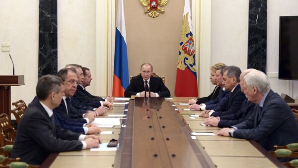 Владимир Путин  проводит совещание с постоянными членами Совета безопасности РФ. Архивное фото