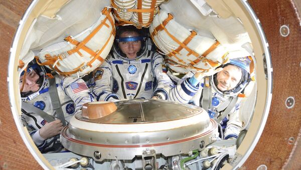 Американский астронавт Скотт Келли, российские космонавты Сергей Волков и Михаил Корниенко. Архивное фото