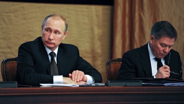 Президент России Владимир Путин и председатель Верховного суда РФ Вячеслав Лебедев на заседании коллегии Федеральной службы безопасности в Москве