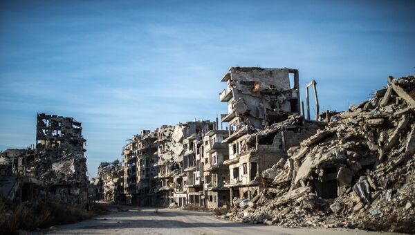 Разрушенные здания в районе Старого города в Хомсе. Архивное фото