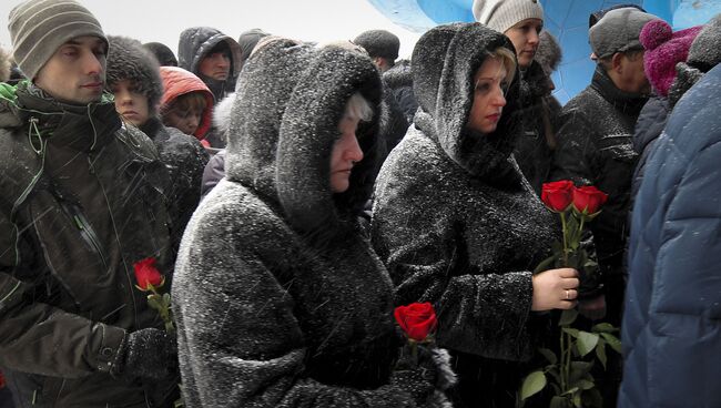 Церемония прощания с шахтерами, погибшими в результате аварии на шахте Северная. Архивное фото