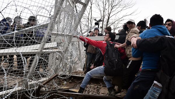 Беженцы на греко-македонской границе близ села Идомени, Греция, февраль 2016