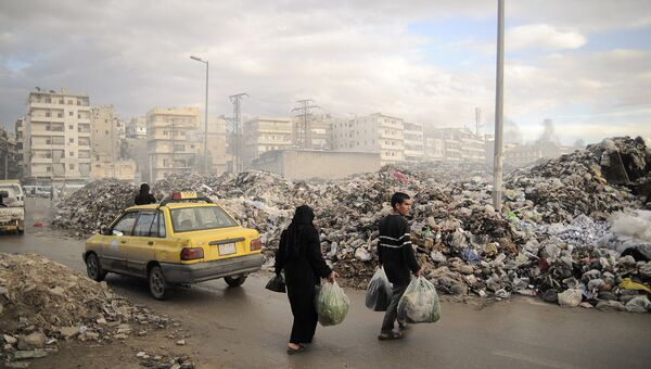 Свалка мусора в городе Алеппо. Архивное фото