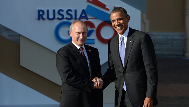 Президент России Владимир Путин (слева) и Президент Соединенных Штатов Америки (США) Барак Обама
