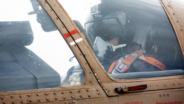 Пилот в кабине штурмовика Су-25 ВКС России на авиабазе Хмеймим в Сирии
