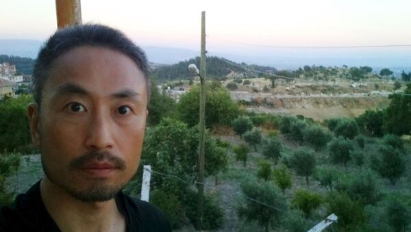 Фотография японского журналиста Дзюмпэя Ясуды во время пребывания в Сирии