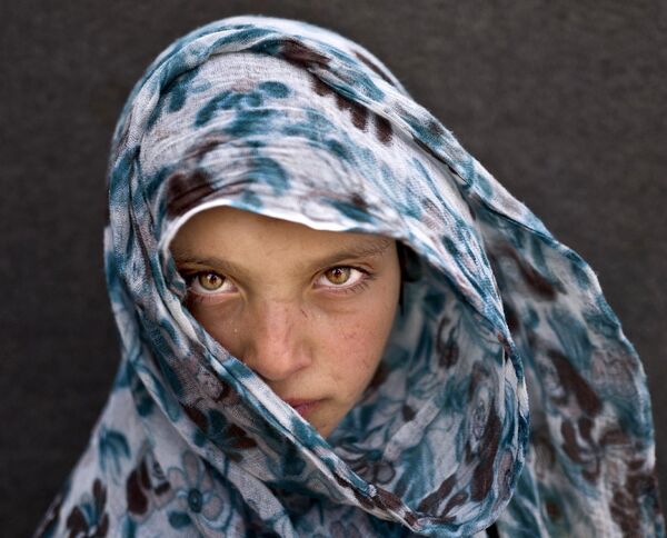 9-летняя сирийская беженка в лагере в окрестностях города Эль-Мафрак, Иордания