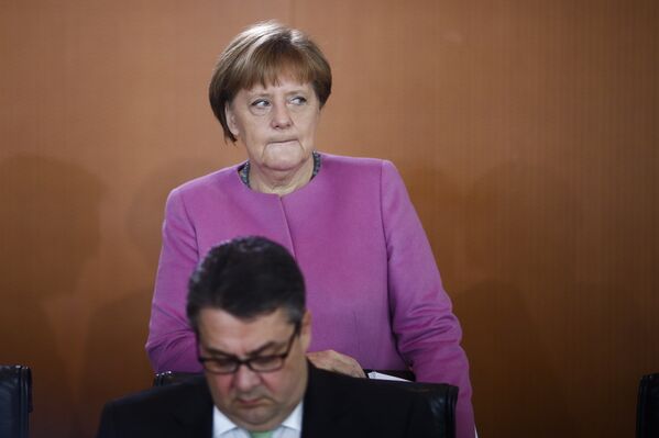 Канцлер Германии Ангела Меркель и министр экономики Зигмар Габриэль на заседании правительства Германии