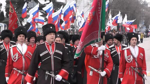 День воссоединения Крыма с РФ в Севастополе: праздничное шествие и митинг
