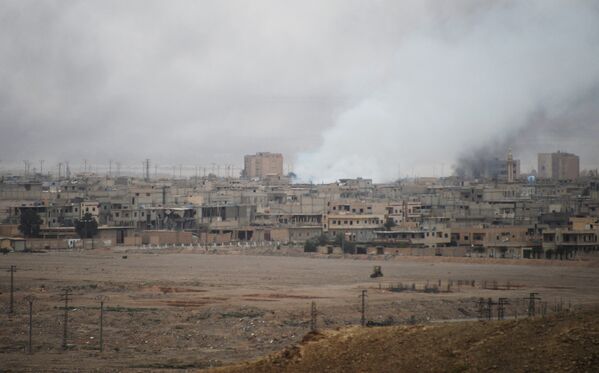 Вид на центральную часть современной Пальмиры, где продолжаются ожесточенные бои между сирийской армией соместно с отрядами народного ополчения Соколы Пустыни и боевиками запрещенной в России организации ИГИЛ