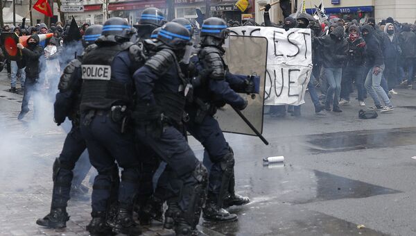 Беспорядки во время акции протеста в Париже против реформы трудового законодательства. 31 марта 2016