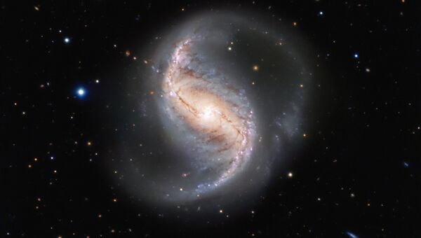 Спиральная галактика NGC 986 в созвездии Печь