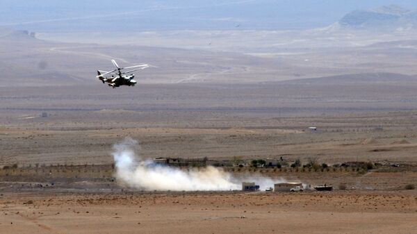 Боевое применение российского вертолета Ка-52 в Сирии. Архивное фото