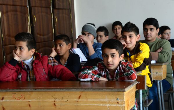 На уроке в дамасской школе, где учатся дети погибших военнослужащих сирийской армии