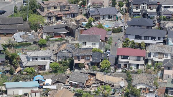 Разрушенные в результате землетрясения здания. Кумамото, Япония. Апрель 2016. Архивное фото