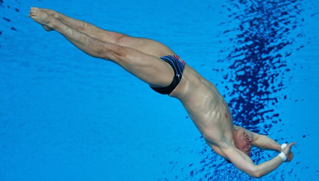 Евгений Кузнецов (Россия) в соревнованиях по прыжкам в воду. Архивное фото
