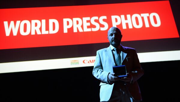 Фотокорреспонденту МИА Россия сегодня В. Песне вручили премию World Press Photo