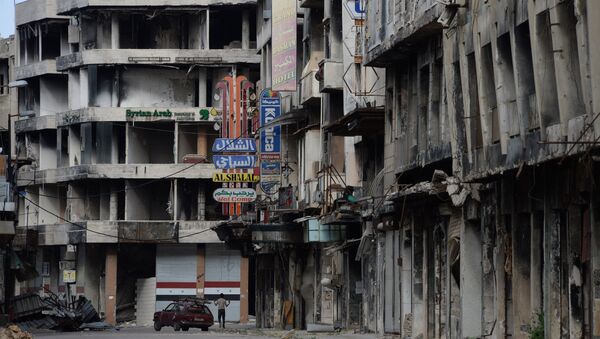 Разрушенные дома на одной из улиц Хомса. Сирия. Архивное фото